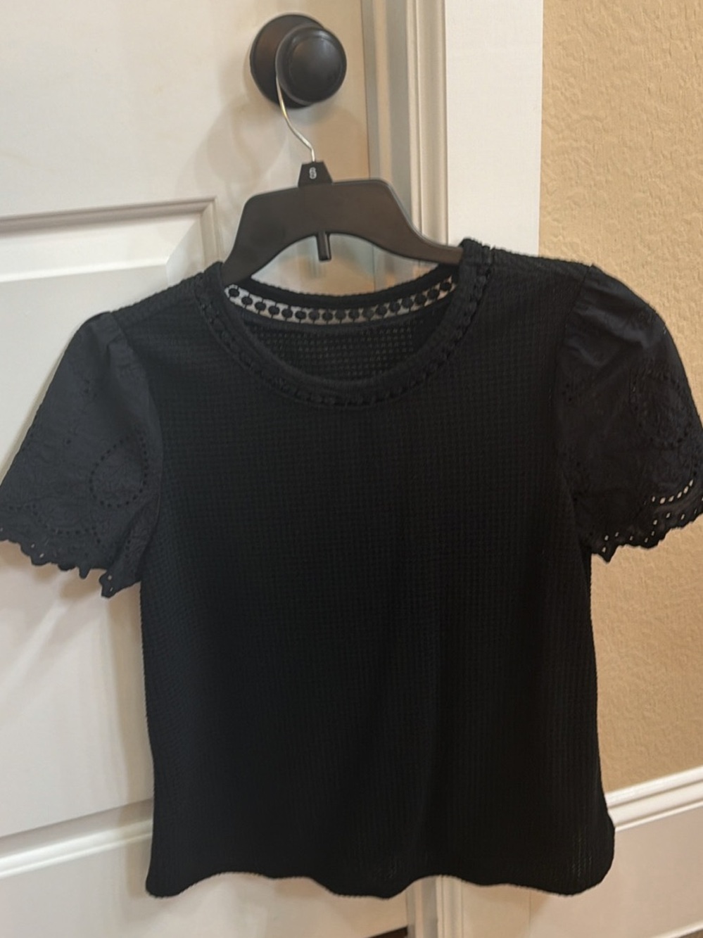 Elegant Black Short-Sleeve Eyelet Tee - Women